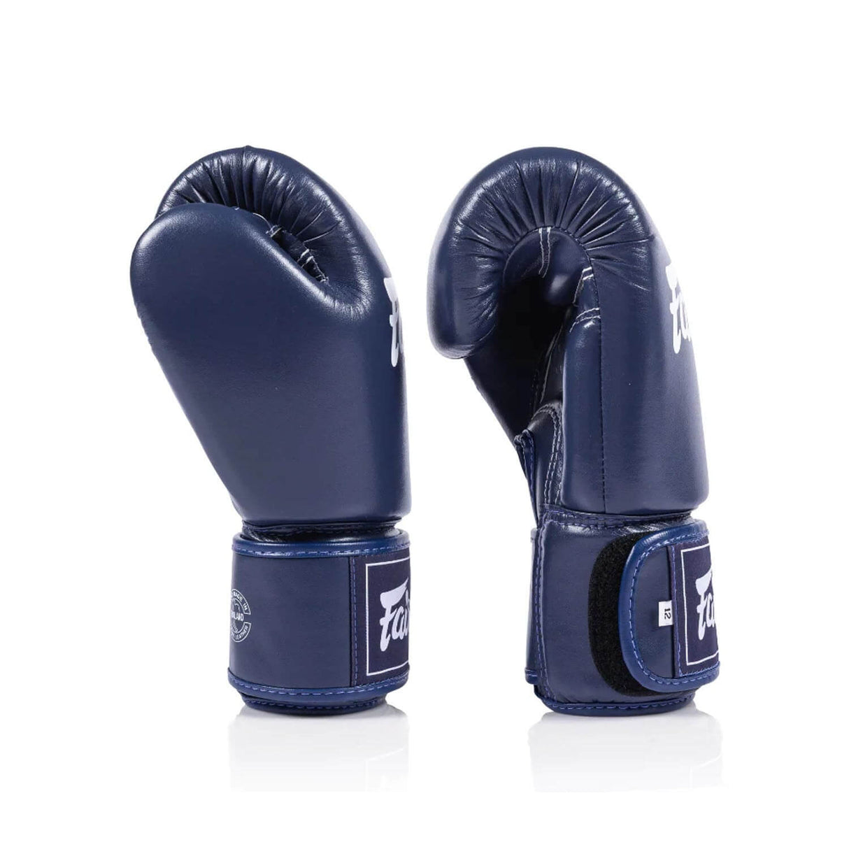Side view of navy blue Fairtex BGV1C PLUS Microfibre boxing gloves on a white background