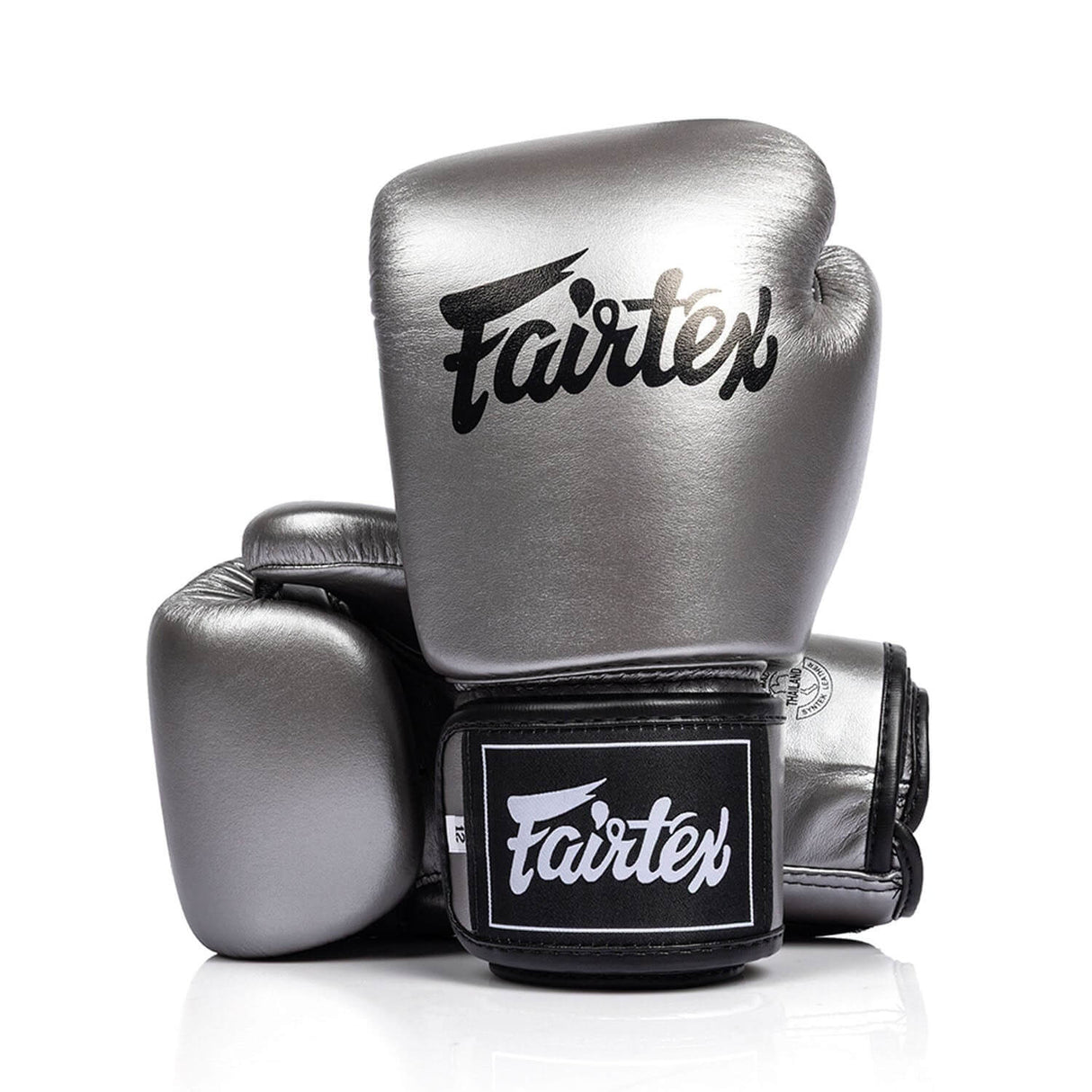 Pair of silver and black fairtex bgv1c plus microfibre boxing gloves on a white background