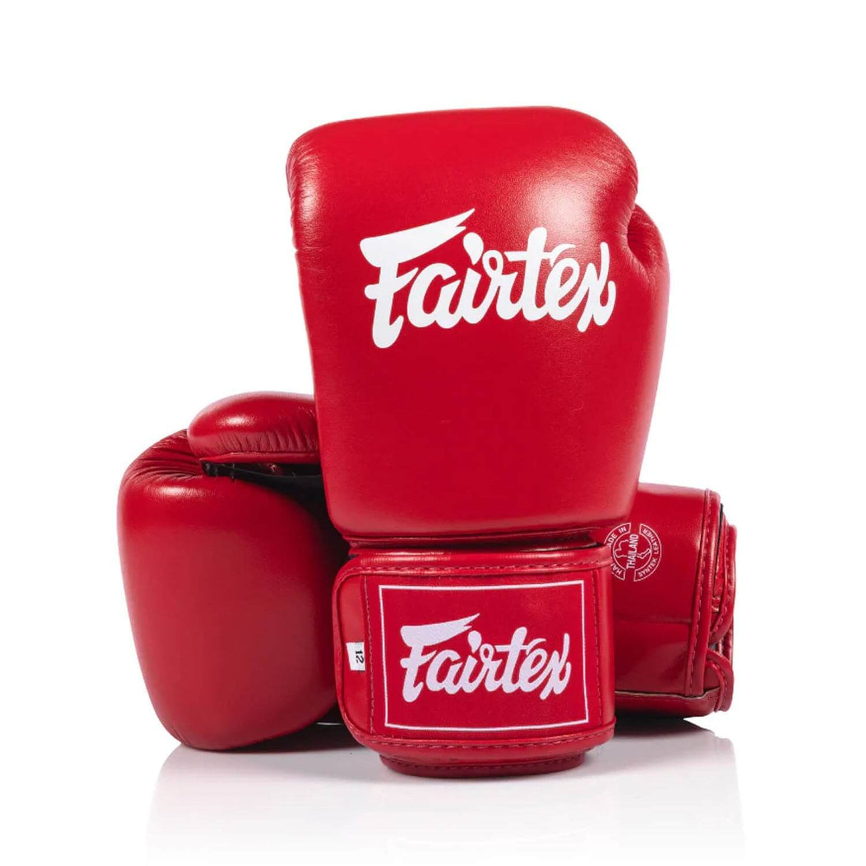 Red fairtex bgv1c plus boxing gloves on a white background
