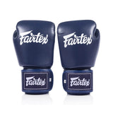 Front view of navy blue Fairtex BGV1C PLUS Microfibre boxing gloves on a white background