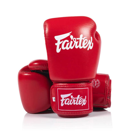 Red fairtex bgv1c plus boxing gloves  on a white background
