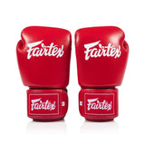 Red fairtex bgv1c plus boxing gloves  on a white background front view