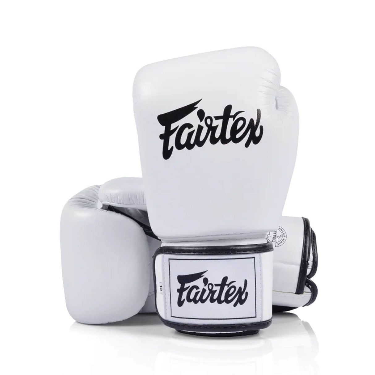 White Fairtex bgv1c plus boxing gloves with velcro closure