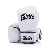 White Fairtex bgv1c plus boxing gloves with velcro closure